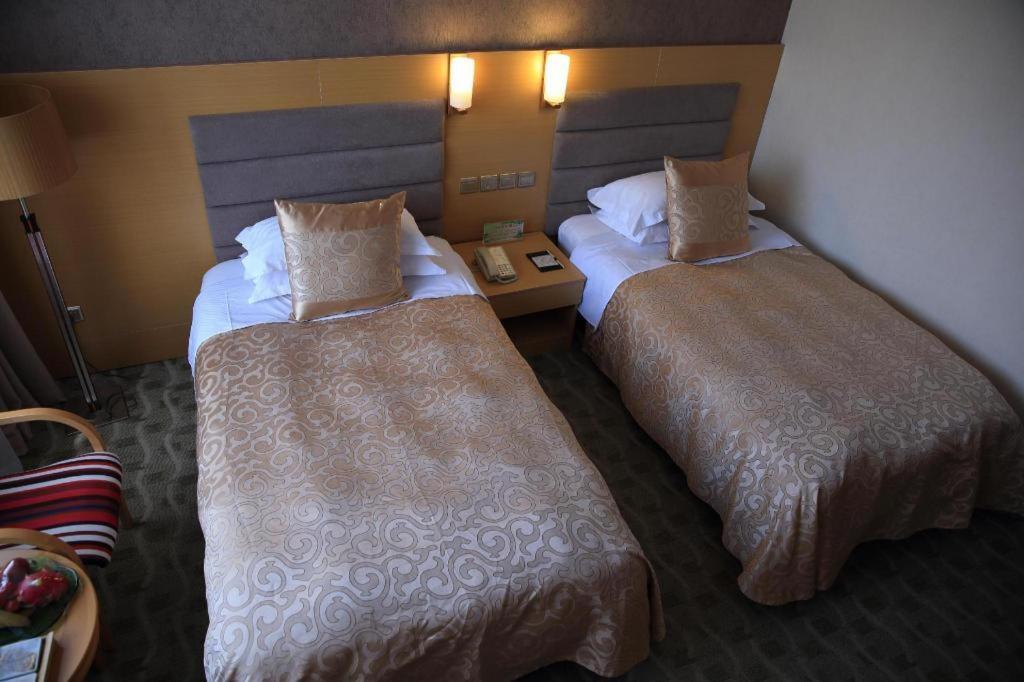 Qingdao Royal Garden Hotel Экстерьер фото