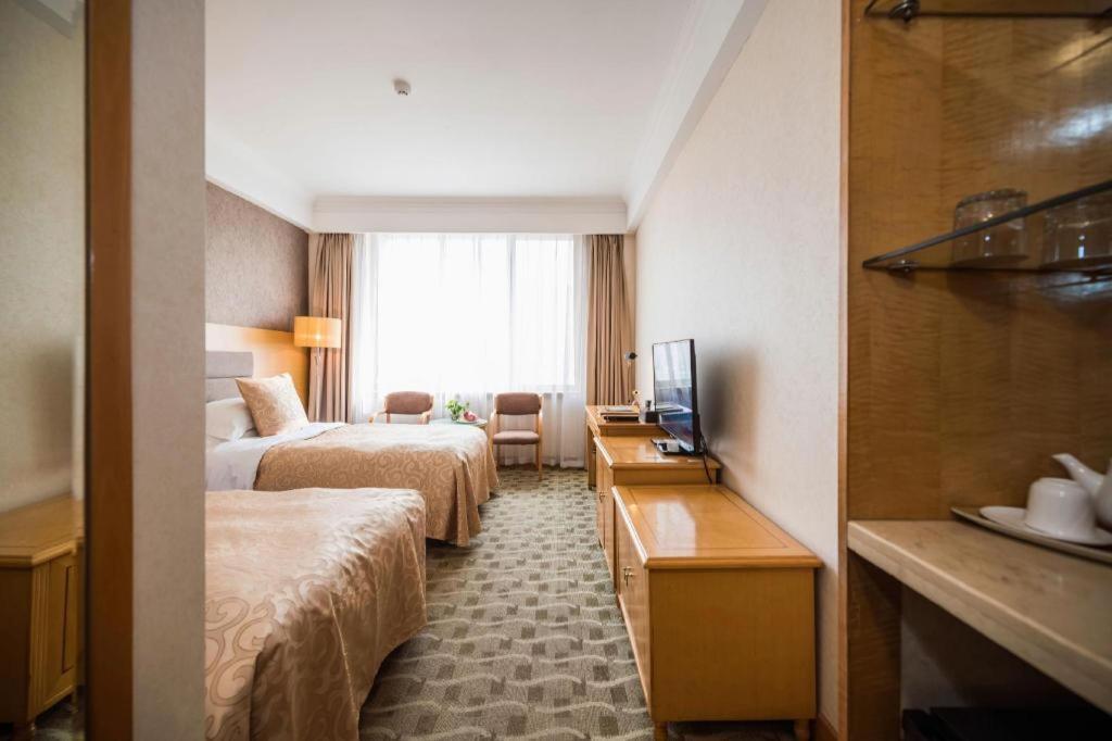 Qingdao Royal Garden Hotel Экстерьер фото