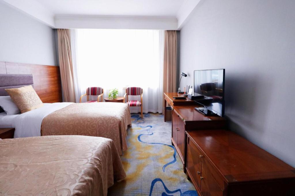 Qingdao Royal Garden Hotel Экстерьер фото