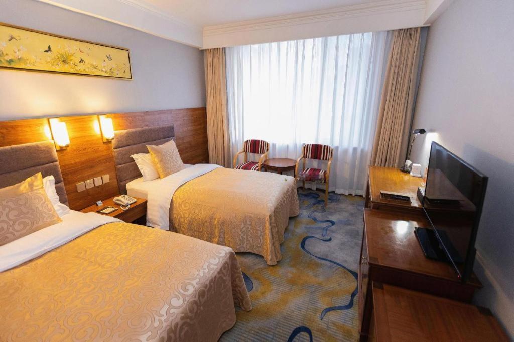 Qingdao Royal Garden Hotel Экстерьер фото